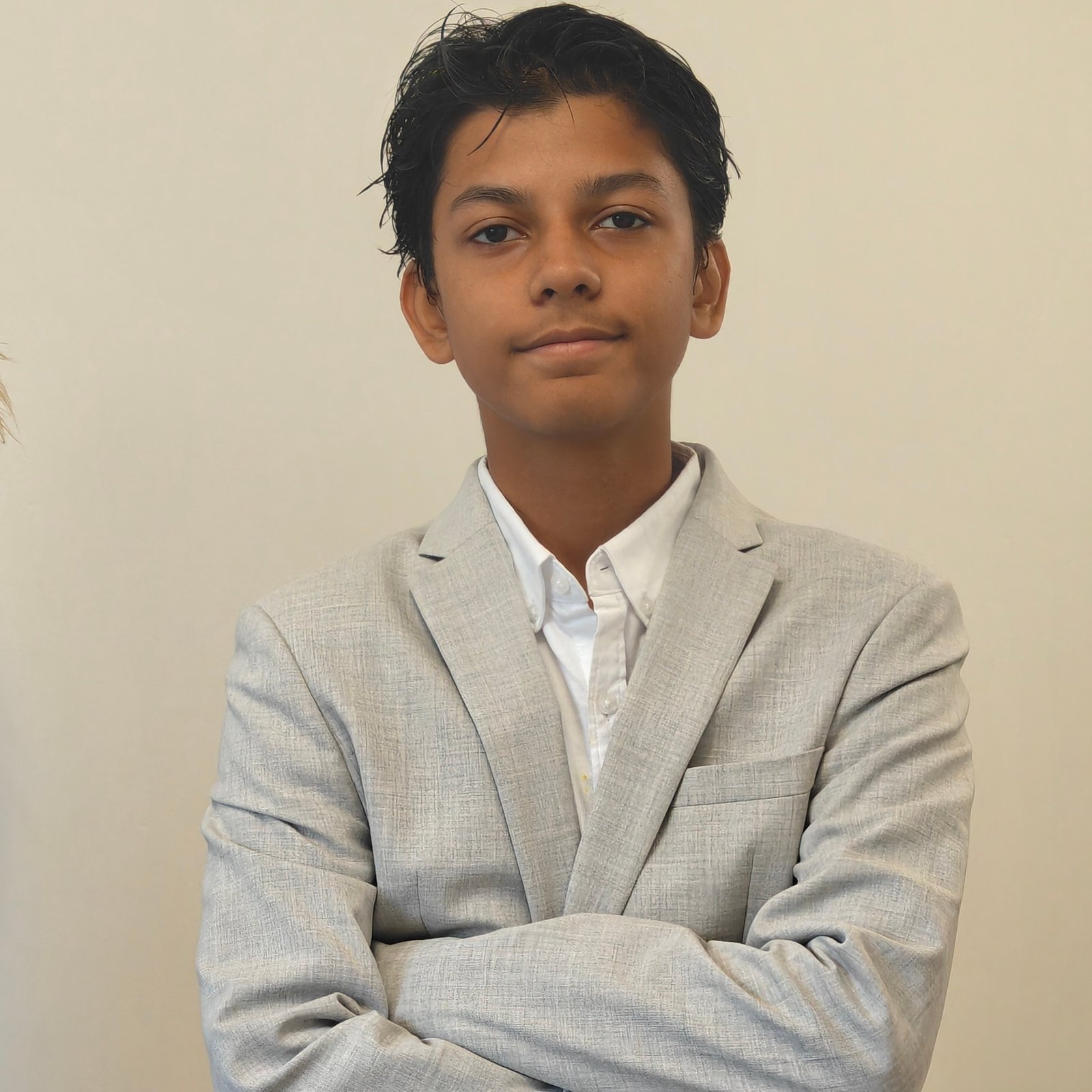 Portrait of Aarush Choubey in a light suit
