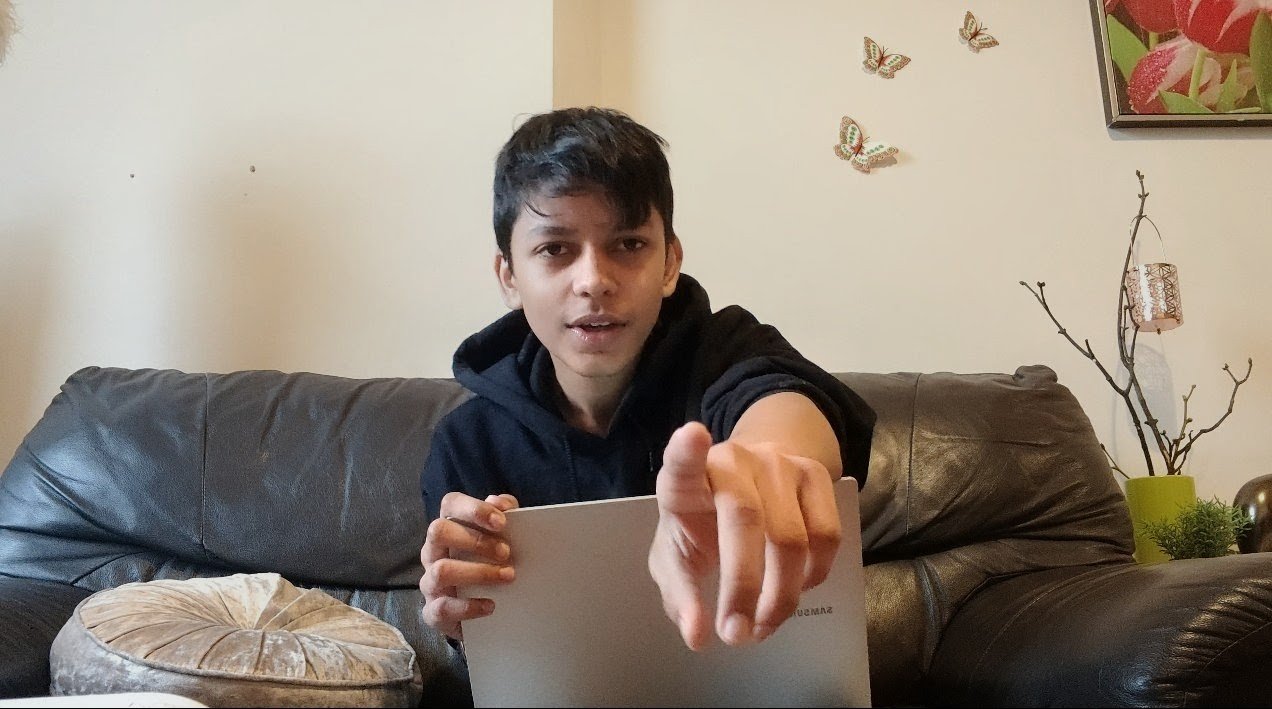 Aarush Choubey creating content with a laptop